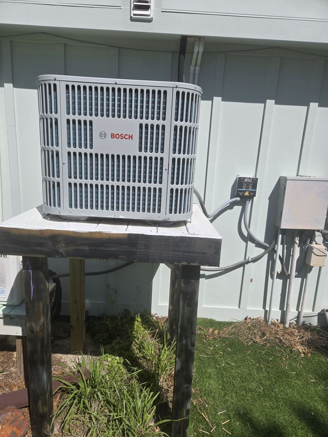 Bosch condenser electrical connections and line set — Bowman HVAC install